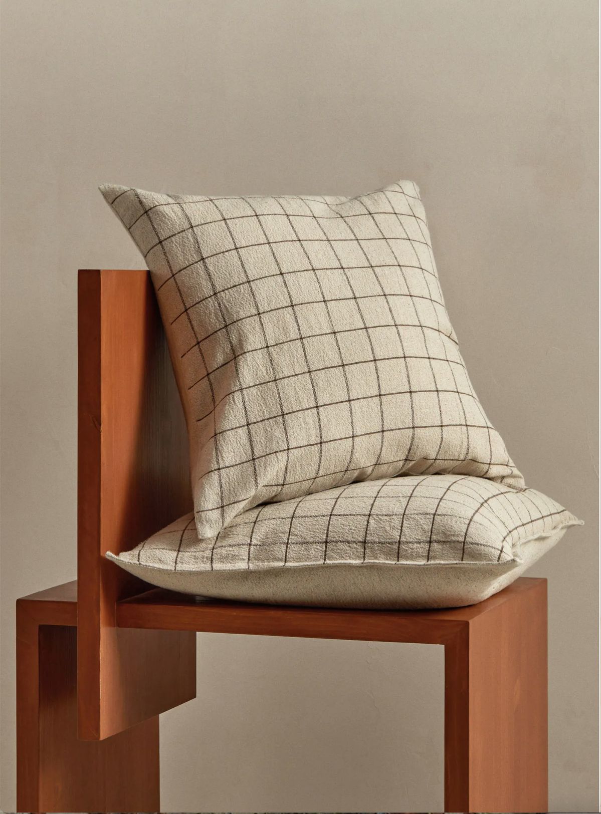 Decorative cushions styled in a warm and comfortable room